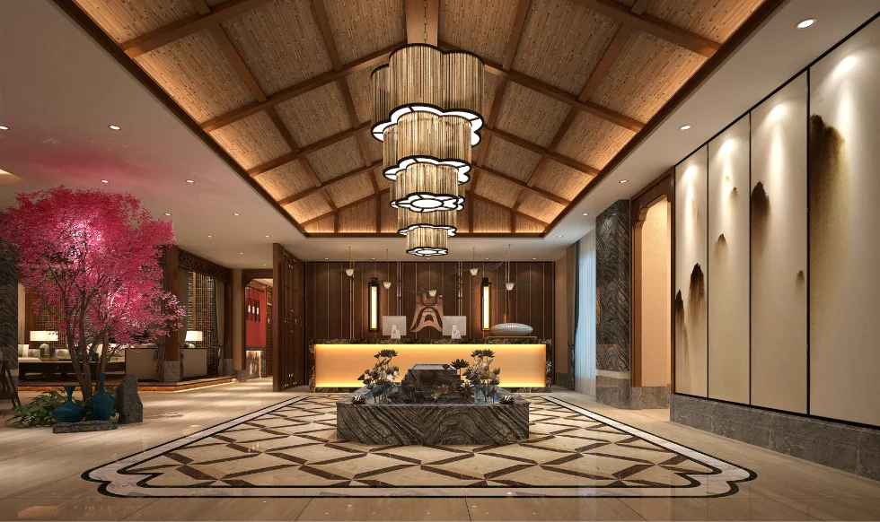 A luxurious hotel lobby with warm lighting, modern chandeliers, a central floral arrangement, and a reception desk, blending traditional and contemporary design elements.